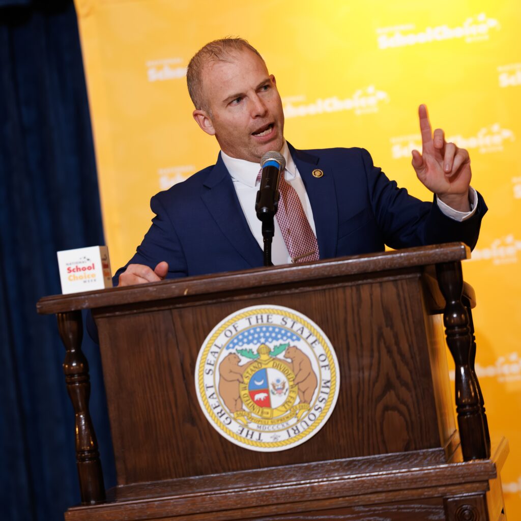 Senator Rick Brattin addressed the audience and introduced Governor Mike Kehoe